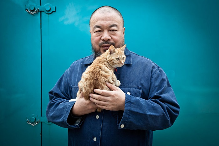 Aiweiwei/艾未未 poses for a portrait in his studio compound.